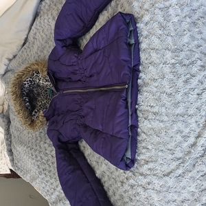 Weather tamer purple girls winter coat. Size 14/16. Fur on the hood.